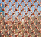 Protecting Buildings and People with Coiled Wire Fabric